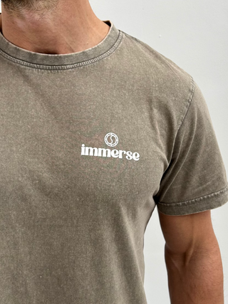 Close-up of acid wash texture on crew neck t-shirt – each piece individually dyed